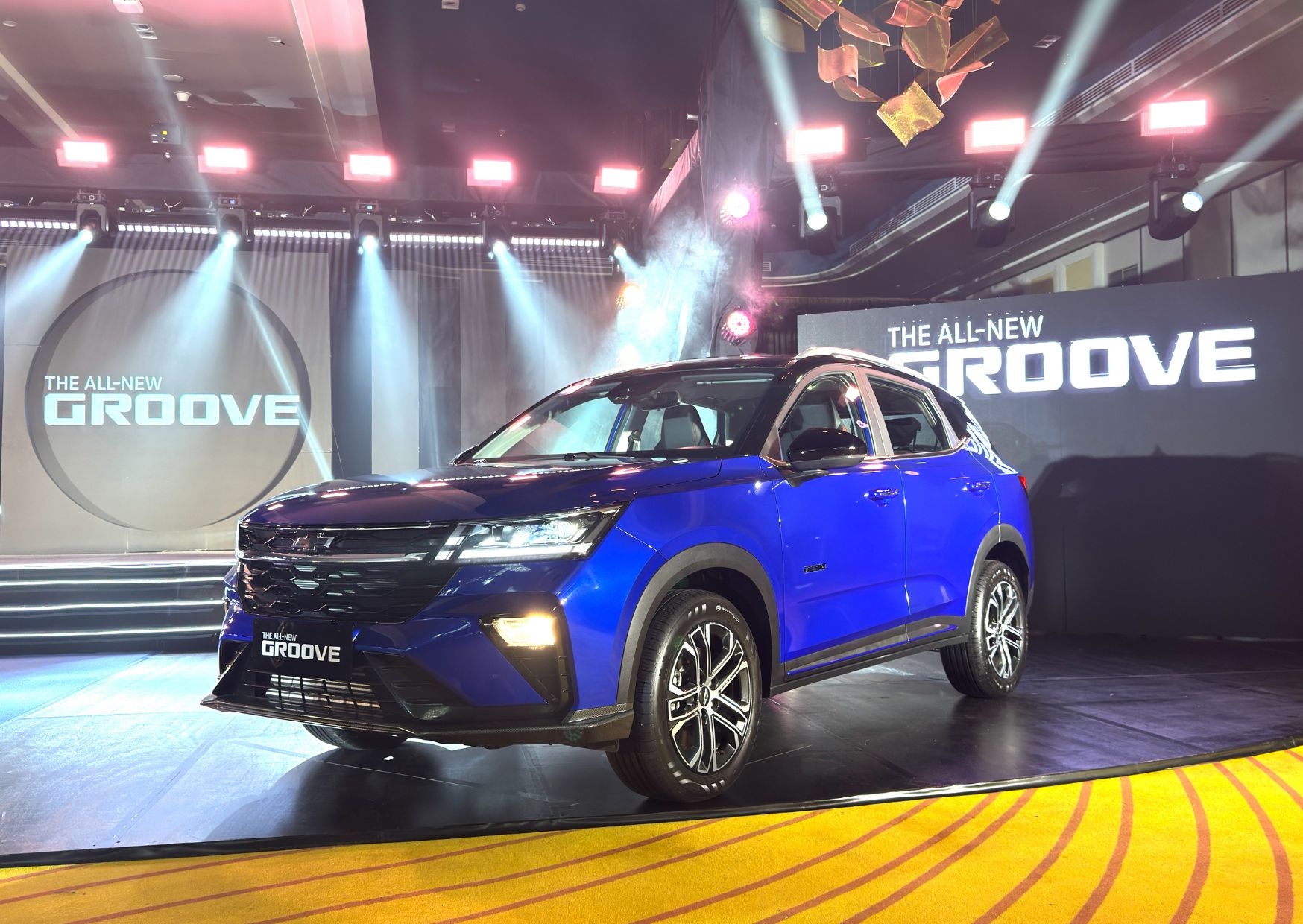 All-new Chevy groove subcompact SUV front left view on the launch stage