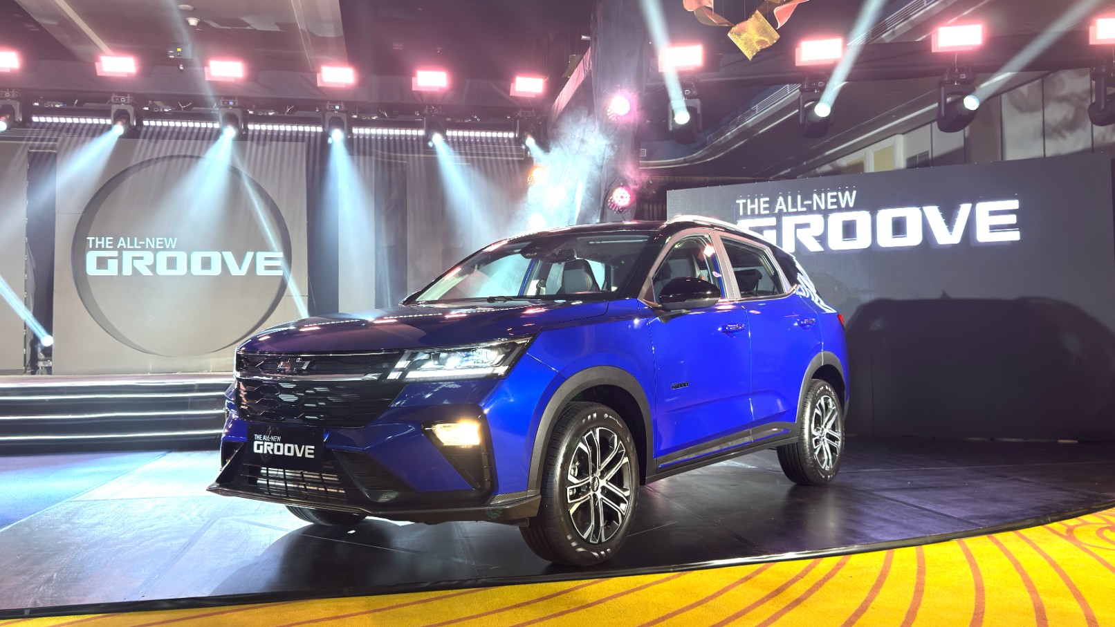 All-new Chevy groove subcompact SUV front left view on the launch stage
