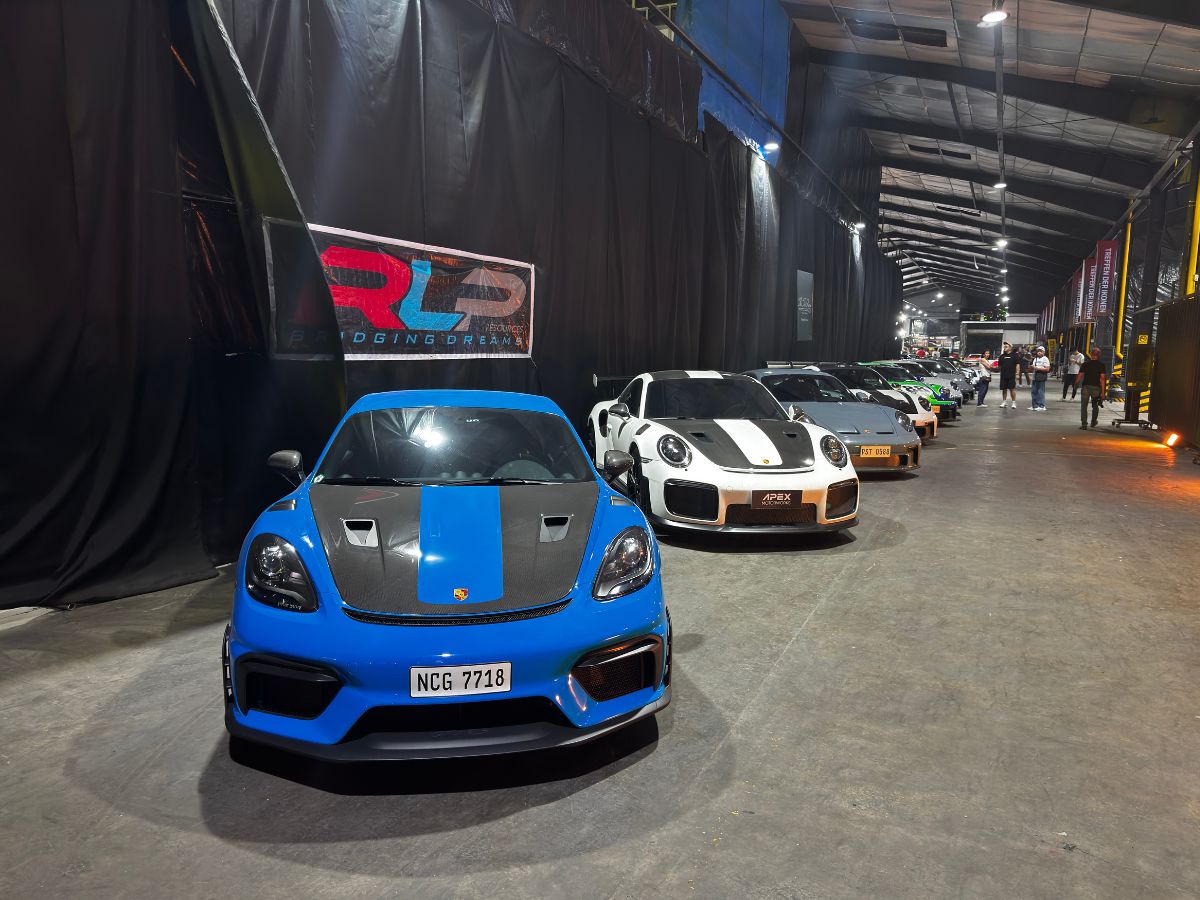 a gathering of Porsche 911 and Porsche owners