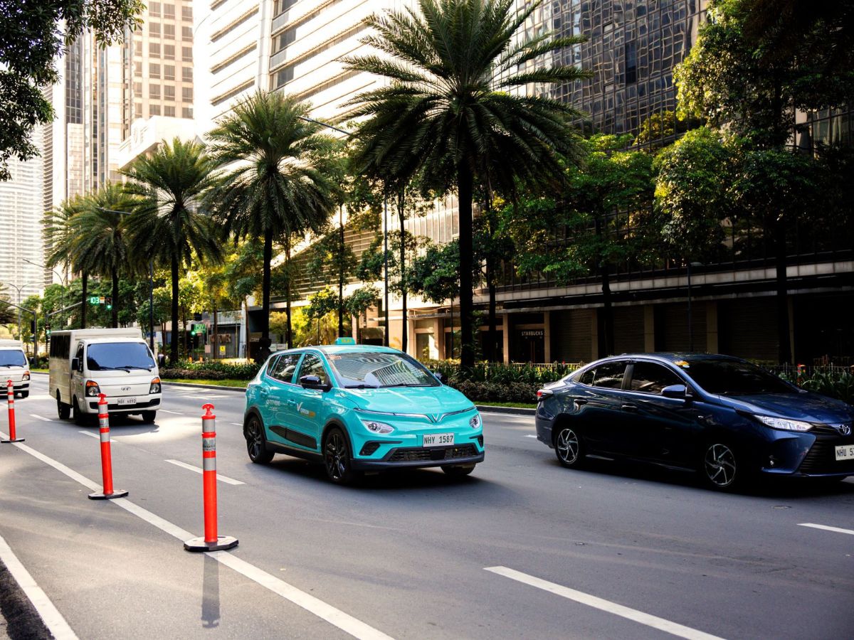 Green GSM EV taxi in the city