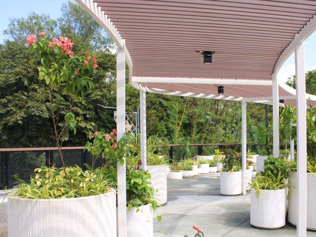 New QC Elevated Landscape Promenade walkway and green landscaping