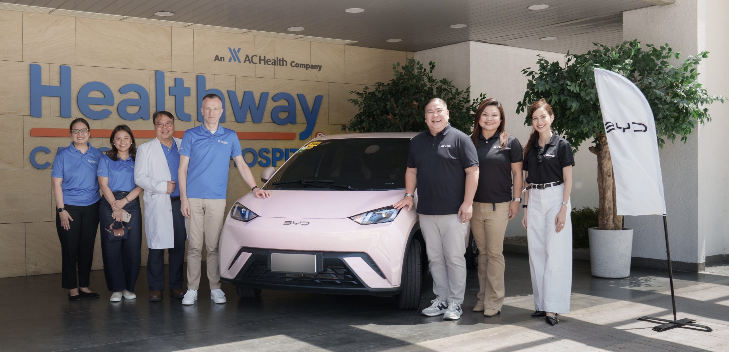 From left: Chiqui Batac, Executive Director of Healthway Foundation; Dr. Kaye Recto, Deputy COO of Healthway Cancer Care Hospital; Dr. Manuel Francisco Roxas, COO of Healthway Cancer Care Hospital; and Jef Peeters, President & CEO of Healthway Medical Network joined by Bob Palanca, Managing Director of BYD Cars Philippines; Ana Melissa Suarez-Paras, PR & Communications Director of ACMobility; Jill Peña, Marketing Director of ACMobility – BYD Cars Philippines