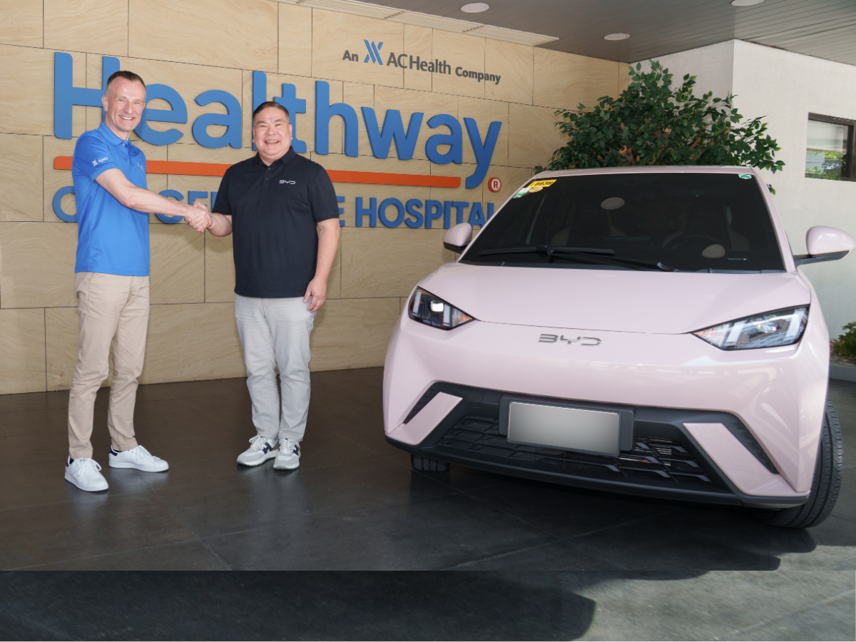 Jef Peeters, President & CEO of Healthway Medical Network (left) and Bob Palanca, Managing Director of BYD Cars Philippines (right)