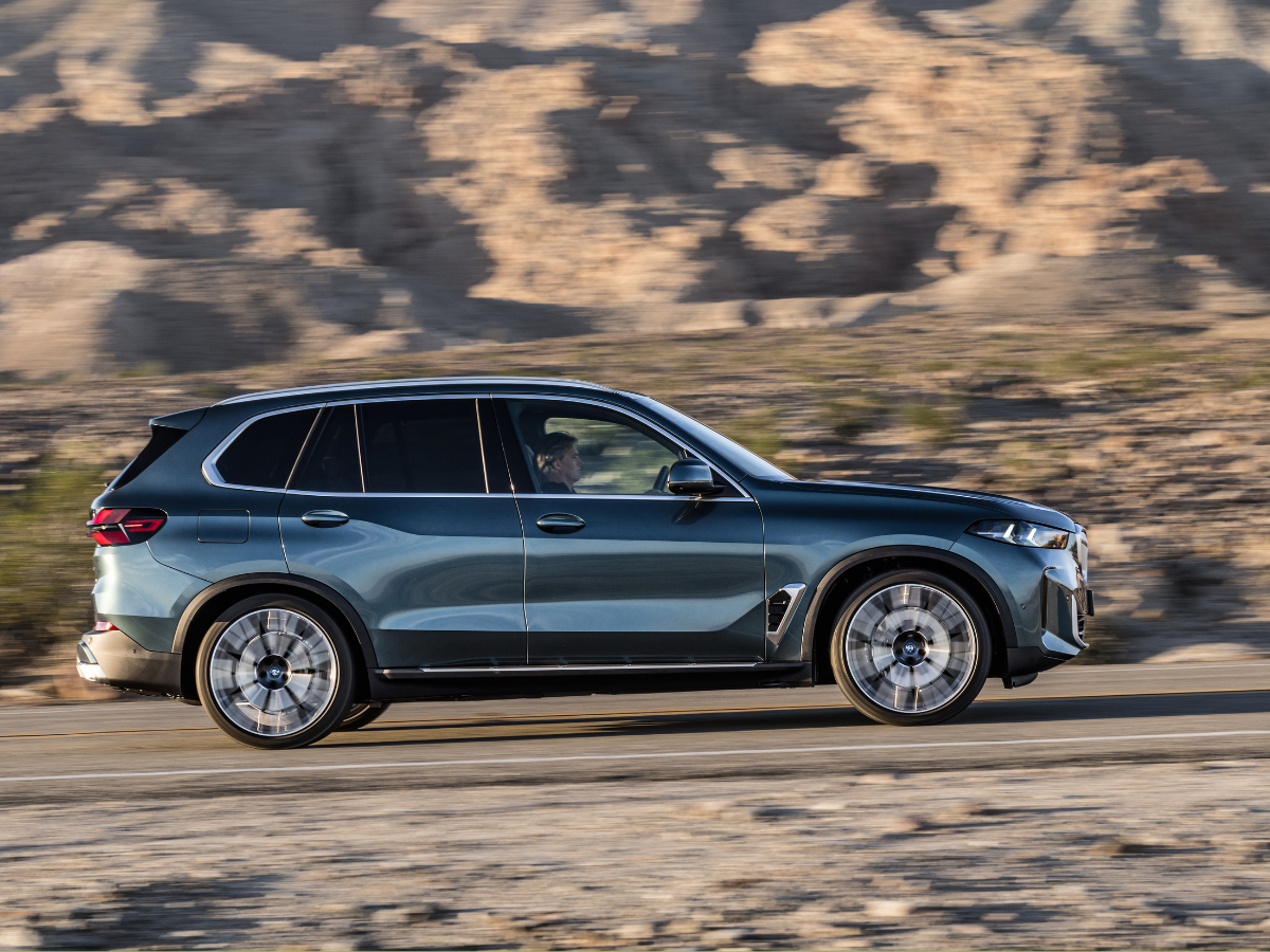 BMW X5 xDrive50e xLine Plug-in Hybrid Electric Vehicle (PHEV) right side, in motion