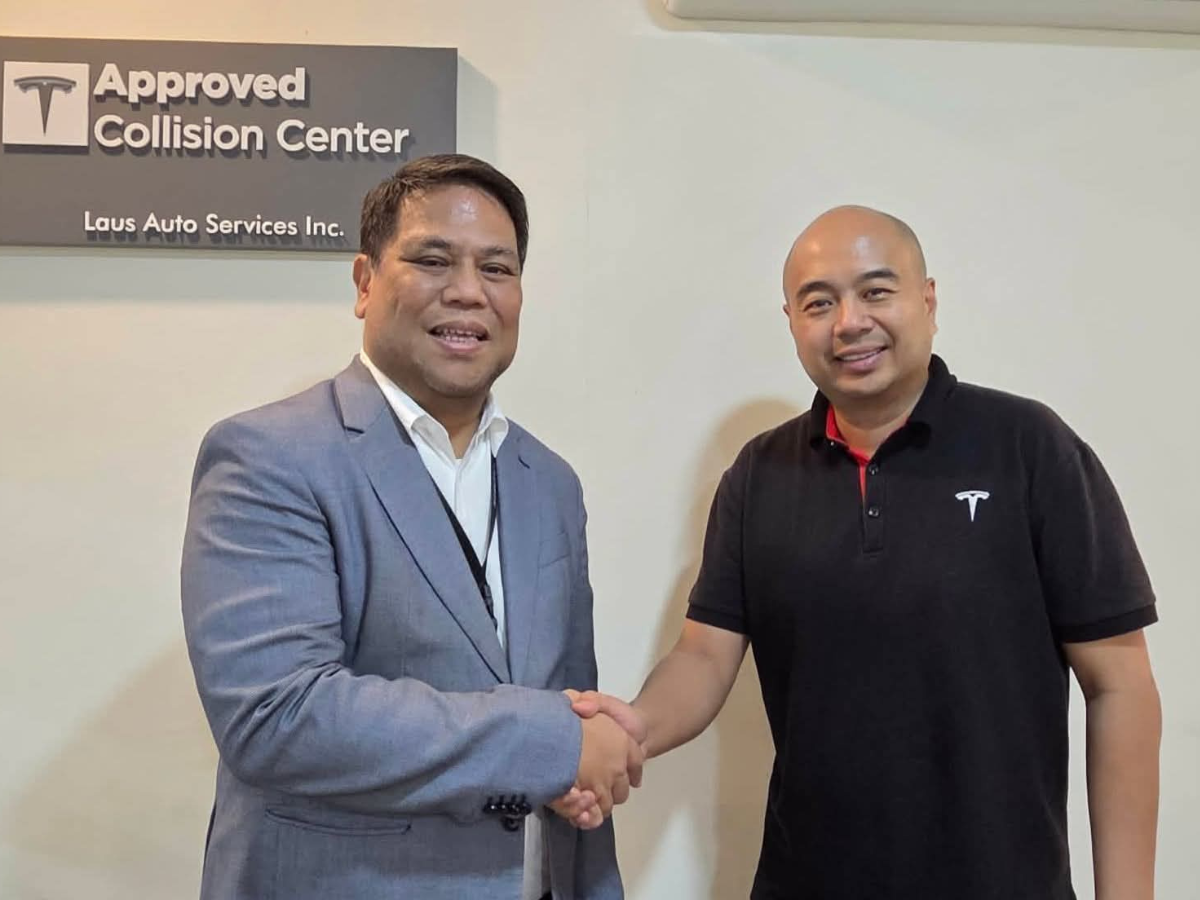From left: Froilan Dytianquin, Laus Auto Group Managing Director and Raymund Marasigan, Tesla Motor Philippines Aftersales Manager