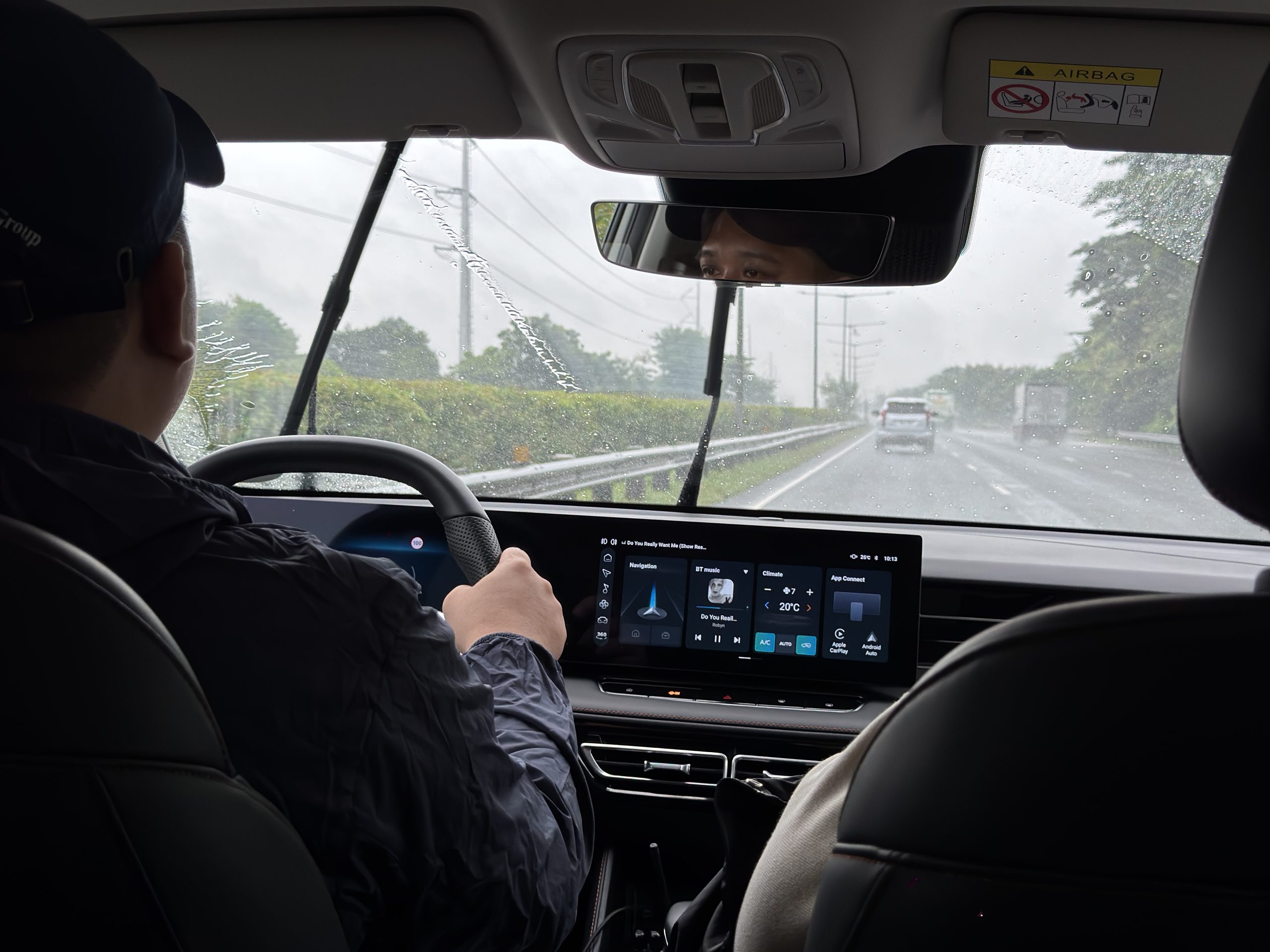 MG HS Hybrid+ front cabin from rear passenger POV