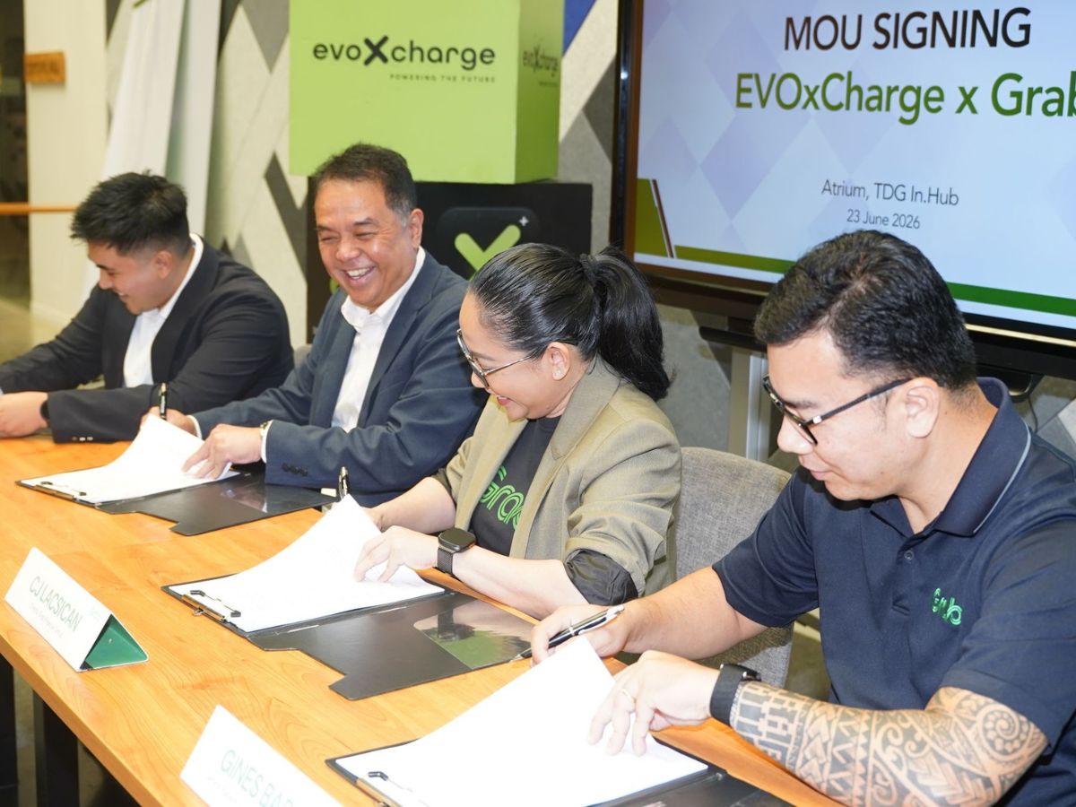 From left: EVOxCharge Business Development Head Rafael Camacho, Vice President and General Manager Derrick Tolentino, Grab Philippines Vice President for Cities CJ Lacsican, General Manager for GrabCar and Mobility Solutions Gines Barot.