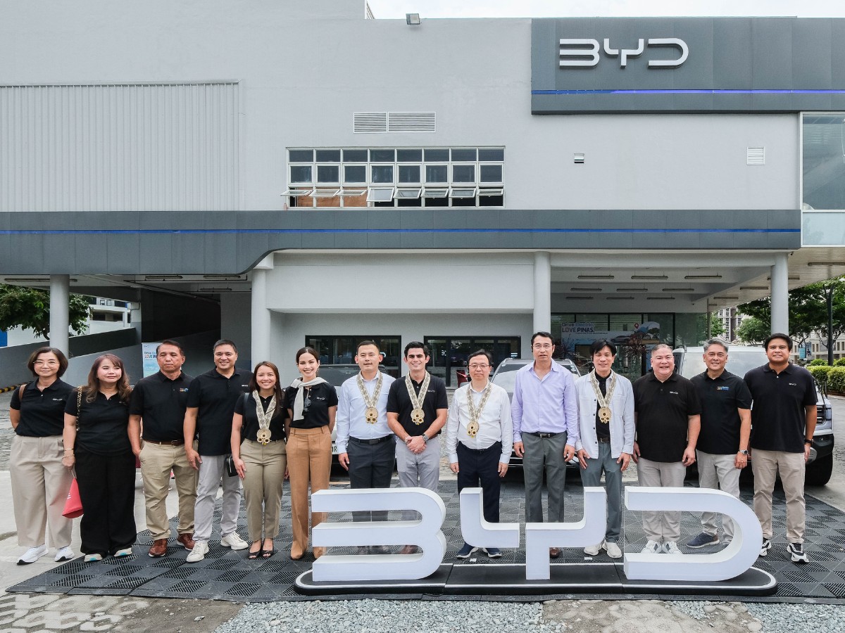 From left: Emi Arboleda, Aftersales Director,  BYD Cars Philippines; Christine Donato, Distributor Chief Finance Officer, BYD Cars Philippines; Steve Gingco, Head of AutoCare and Retail Group, Iconic Dealership Inc.; Erroll Dueñas, Network Director, BYD Cars Philippines; Dana Uson, Head of Strategy, ACMobility and President of ACMobility Premium Dealership Inc.; Isa Suarez-Paras, PR and Communications Director, ACMobility; Adam Hu, Country Head, BYD and DENZA Philippines; Jaime Alfonso Zobel de Ayala, CEO, ACMobility; Wang Chuanfu, Chairman and President, BYD Co., Ltd.; Liu Xueliang, Vice President of BYD Co., Ltd. and General Manager, BYD Asia-Pacific Auto Sales Division; James Ng, General Manager of BYD Singapore; Bob Palanca, Managing Director, BYD Cars Philippines; Dennis Salvador, Head of BYD Brand, Iconic Dealerships Inc., ACMobility; Jolo Aranas, Sales Director, BYD Cars Philippines 